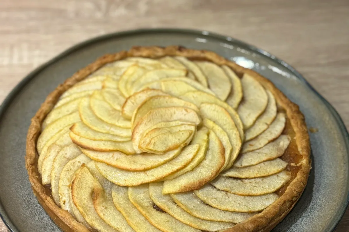 Canned apple pie filling in quart jars with cinnamon and fresh apples