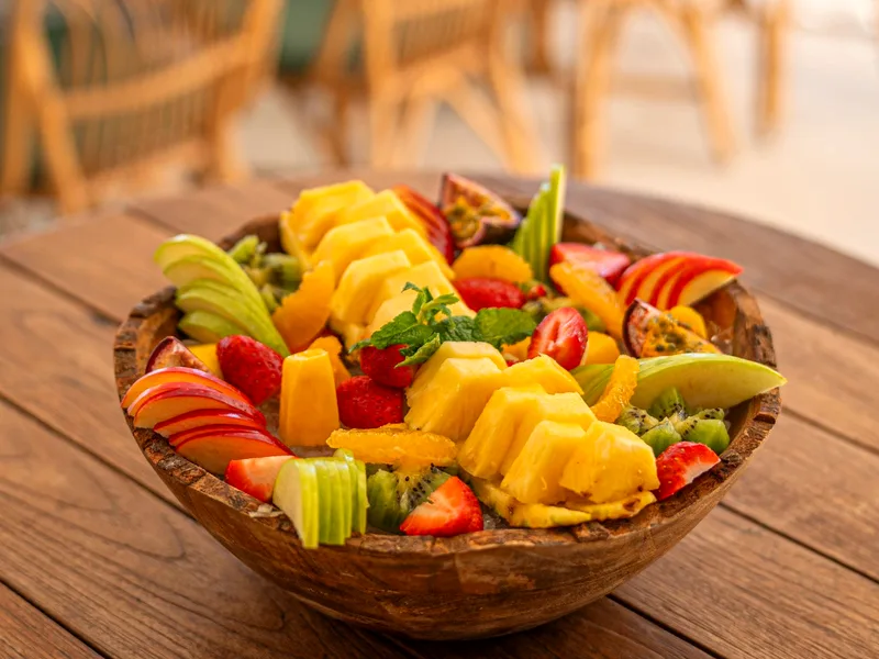Orange fluff salad with mandarin oranges and pineapple in a serving bowl